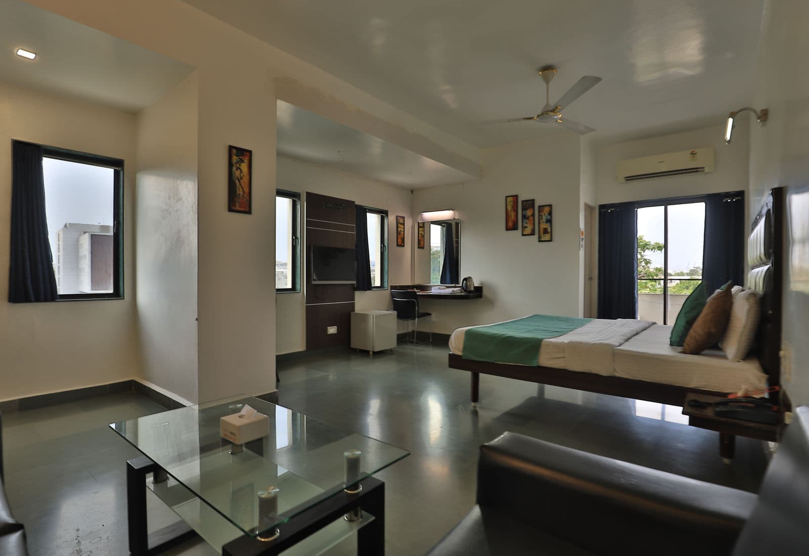 Superior AC room with seating area at Hotel Hospice